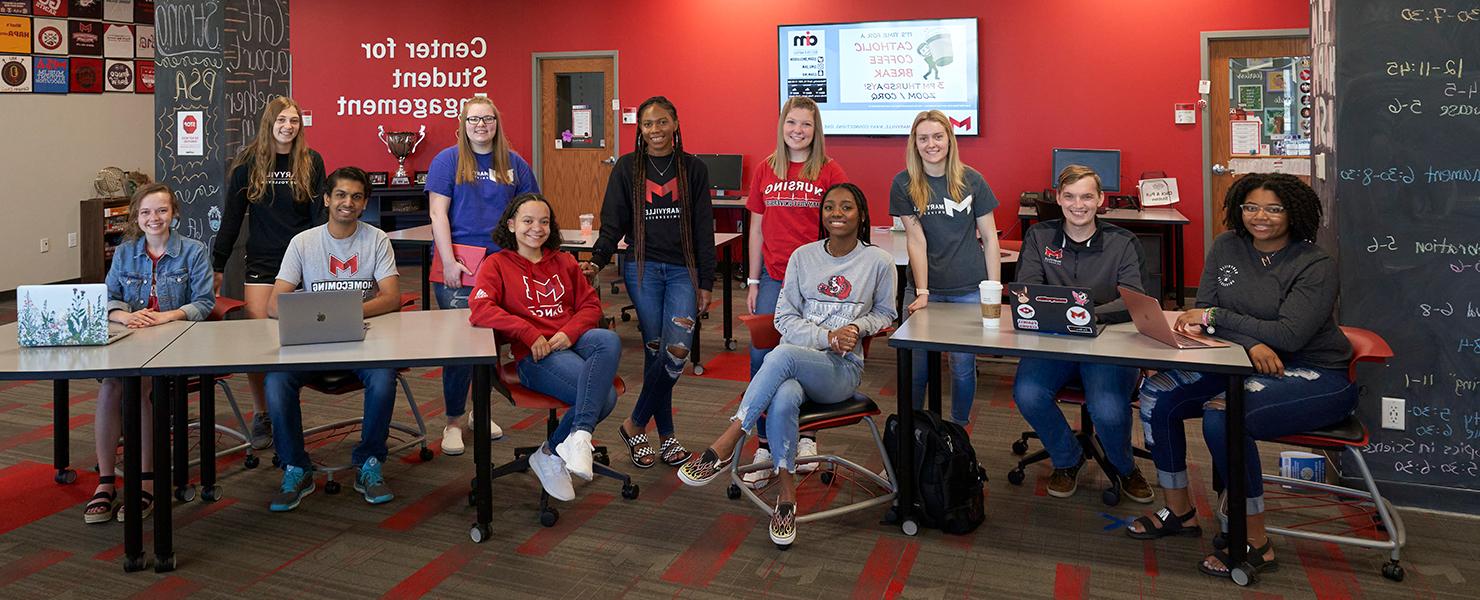 Diverse group of students working together at the Center for Student Engagement.